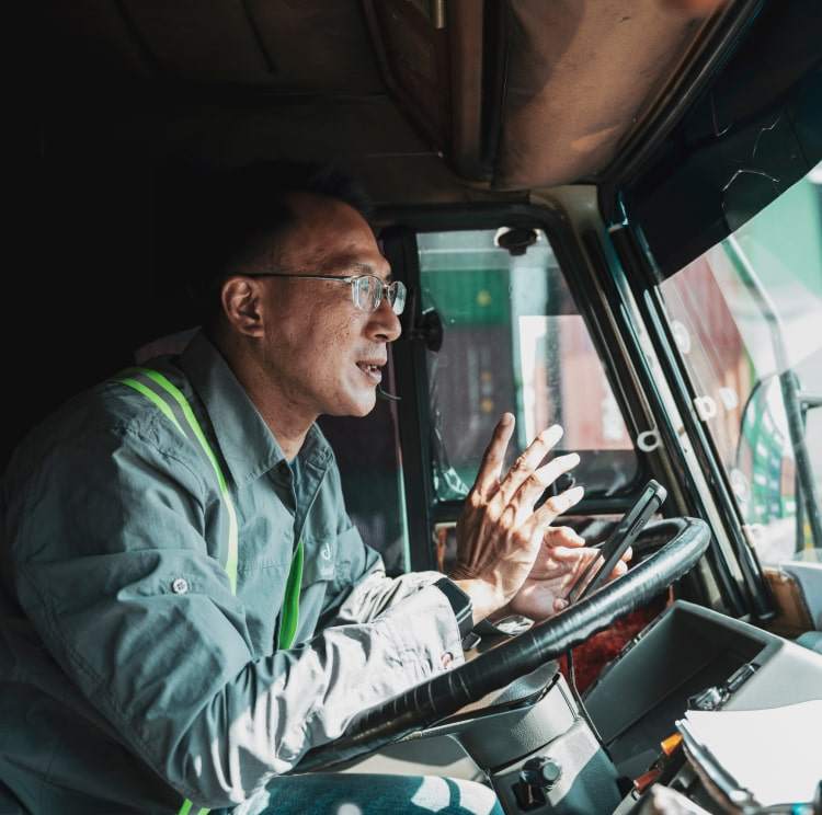 man on phone in truck