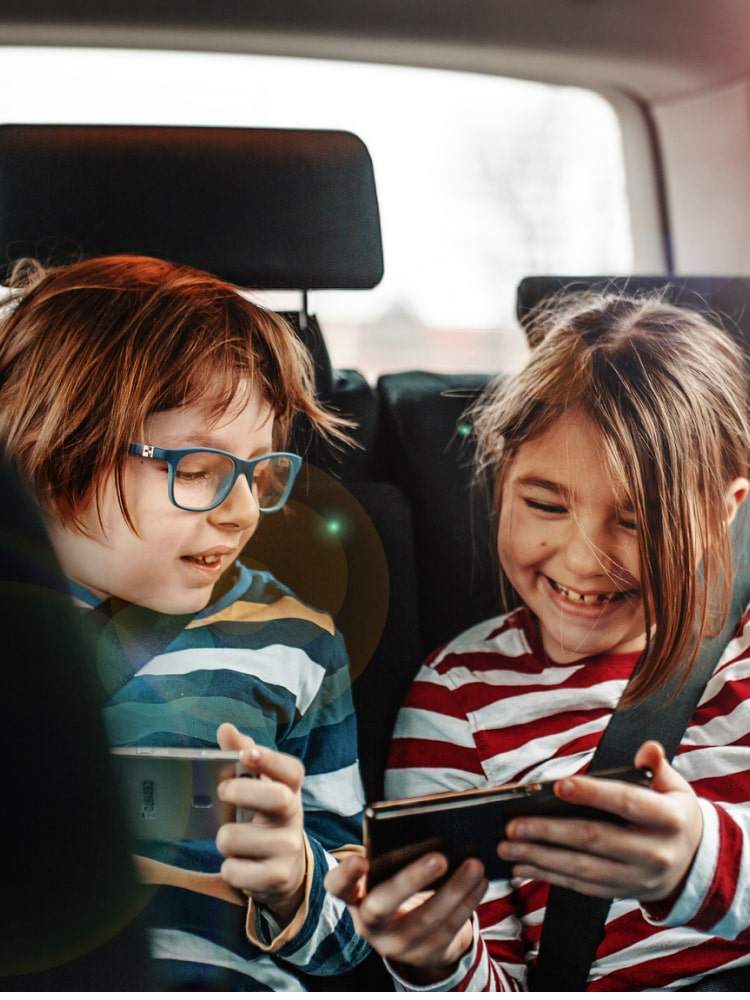 happy kids in the car