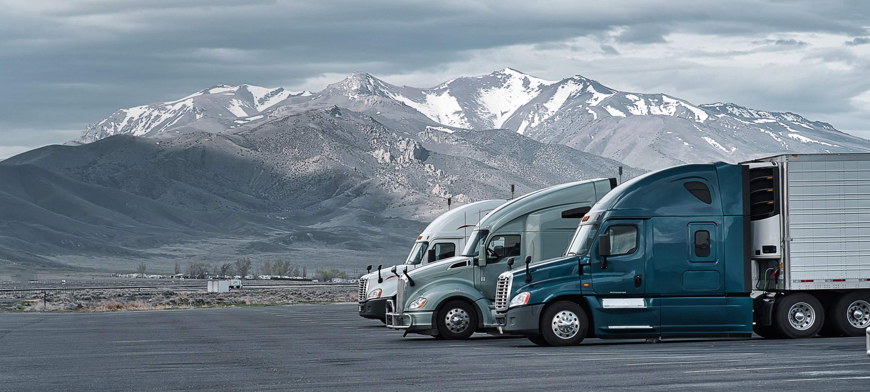 semi trucks with mountain