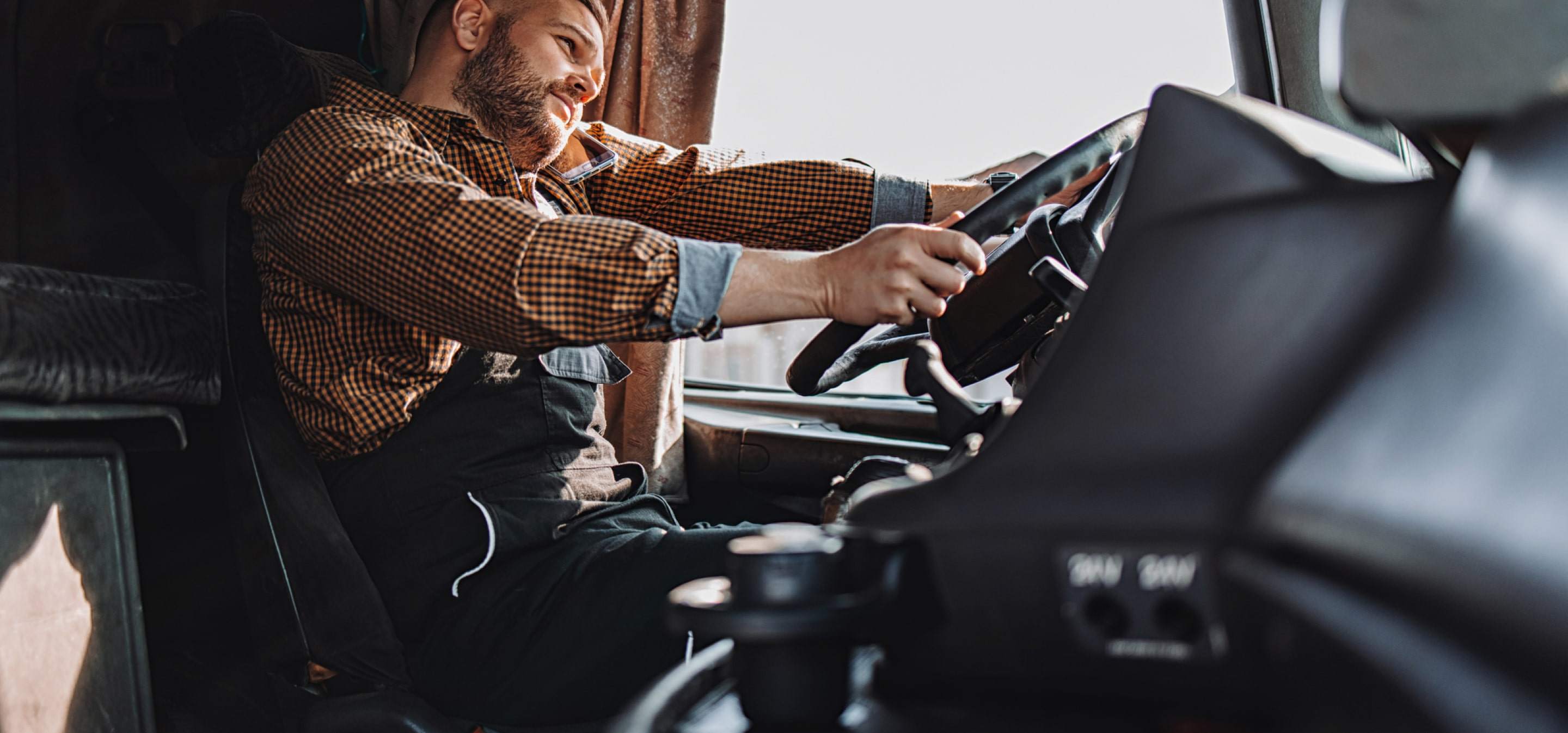 trucker driving while talking on the phone