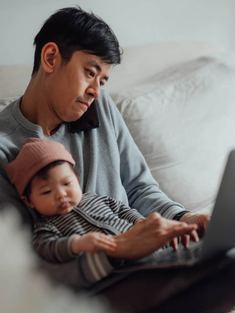 father and son on couch