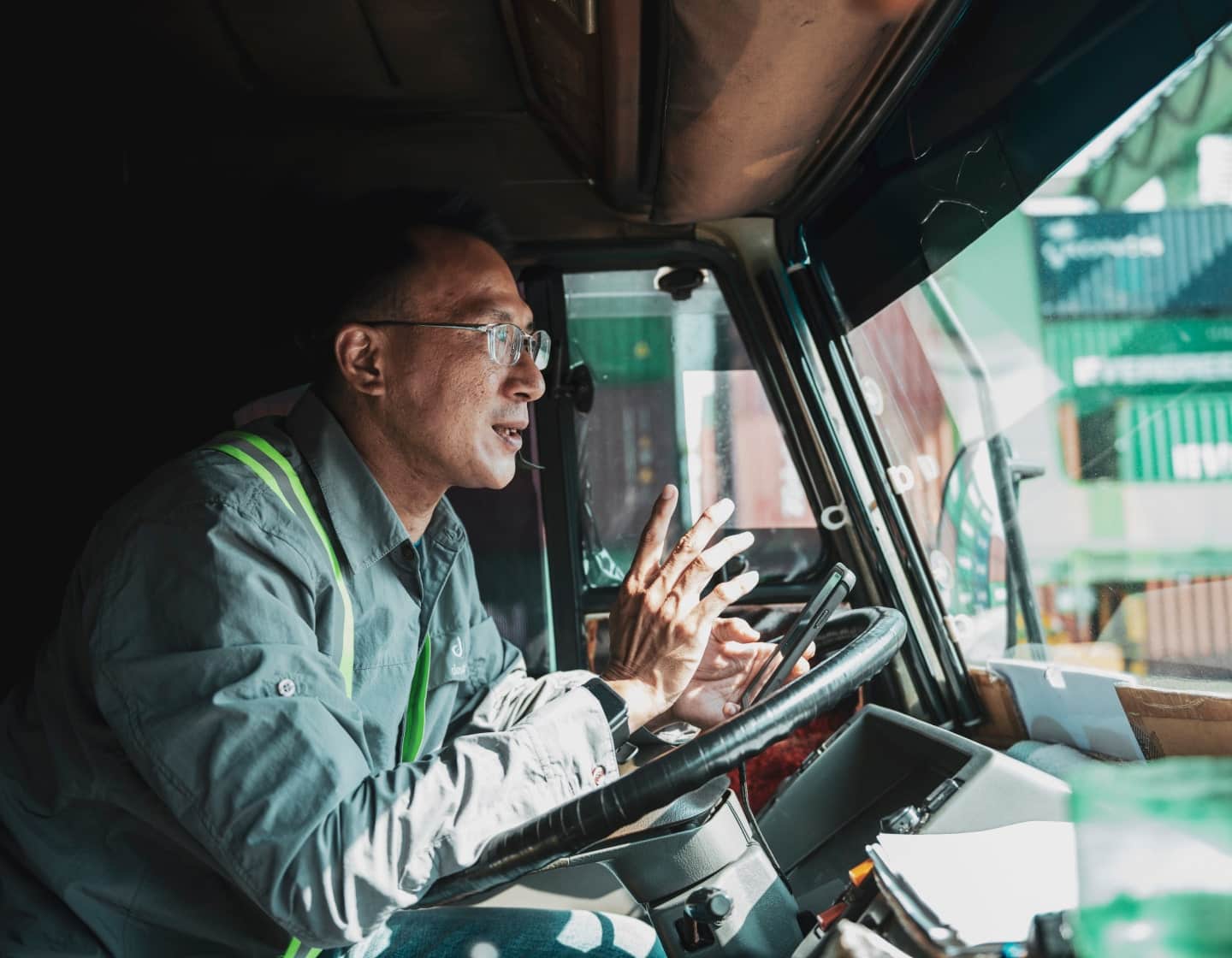 man on phone in truck