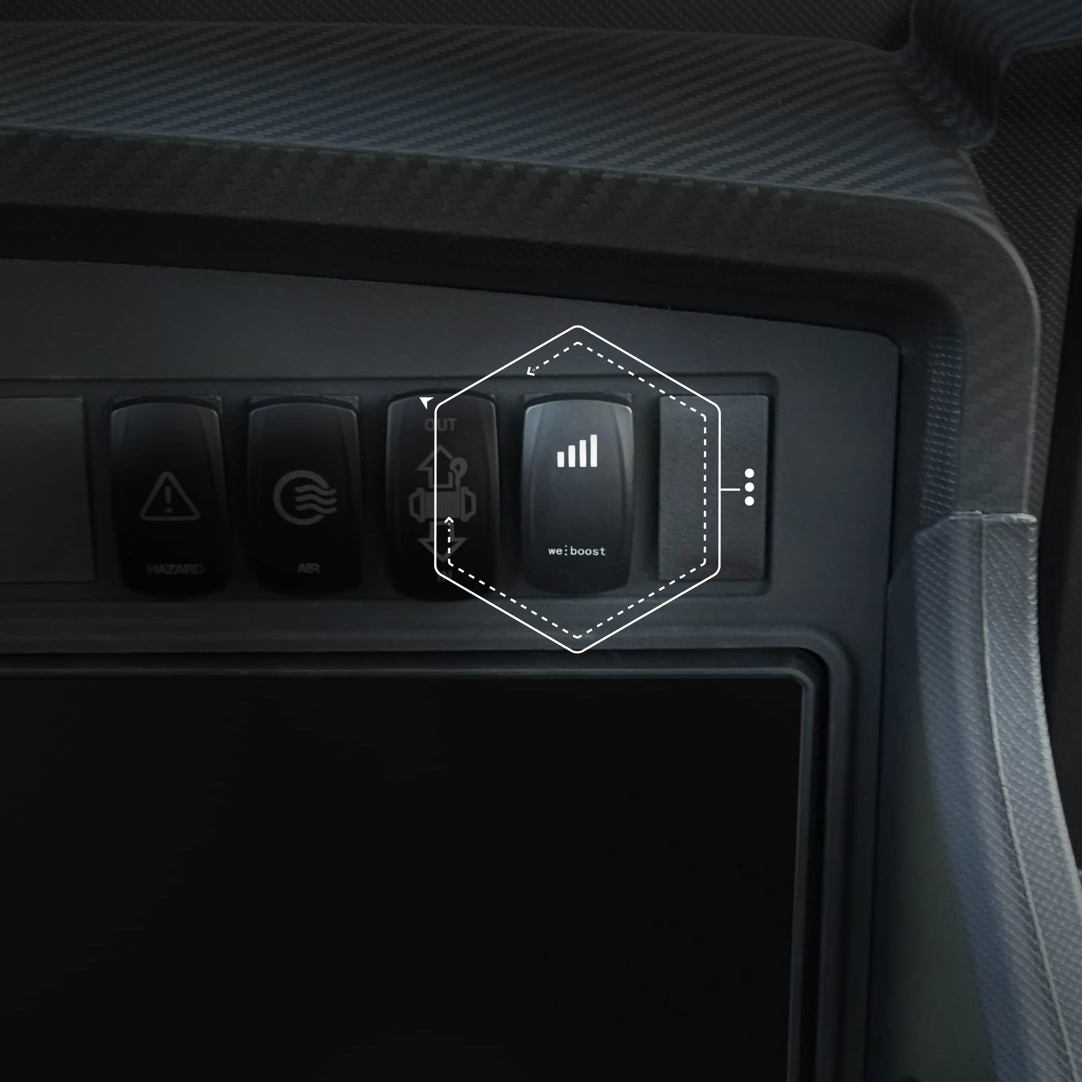 weBoost rocker switch installed in a side-by-side dashboard switch panel