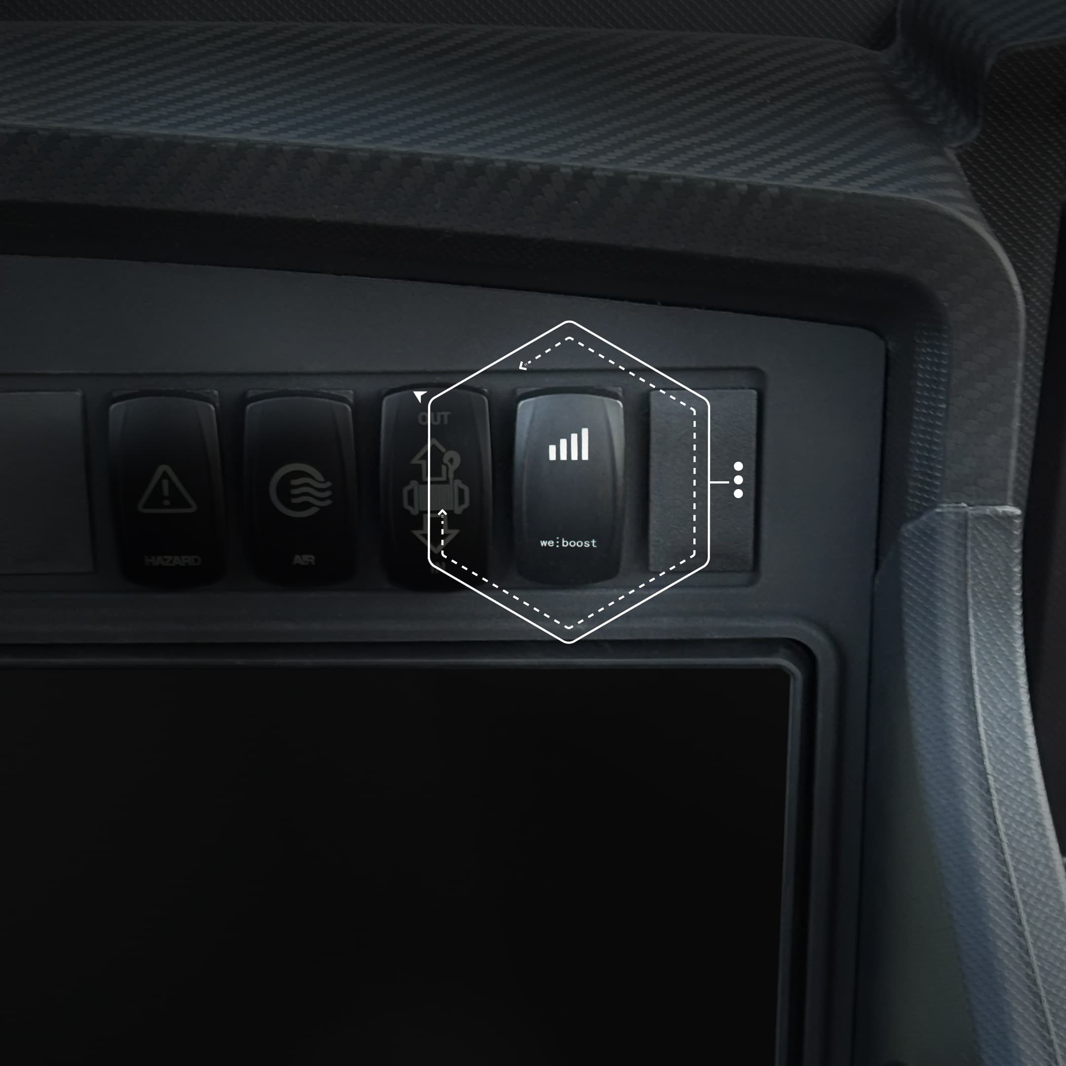 weBoost rocker switch installed in a side-by-side dashboard switch panel
